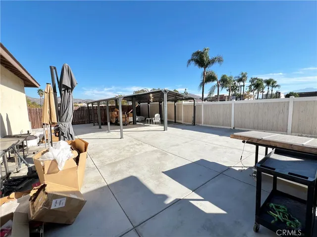 a view of a living room and a flat screen tv