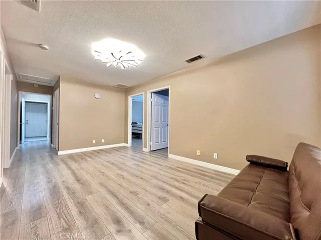 a view of livingroom with furniture and wooden floor