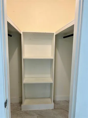 a view of a garden with a bench