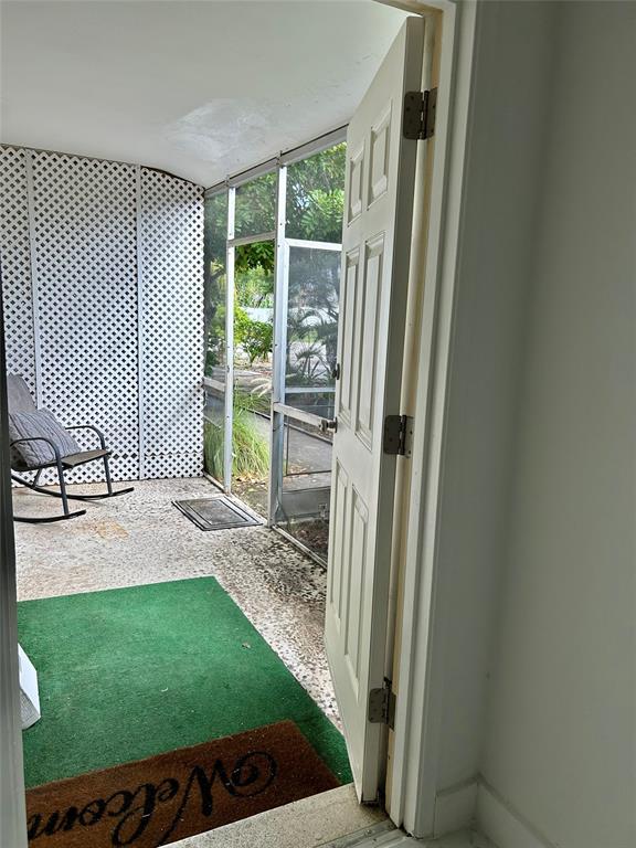 1301 Southeast 22nd Avenue, Unit 4 Pompano Beach, FL 33062 - Photo 4 of 14 a view of outdoor space and porch