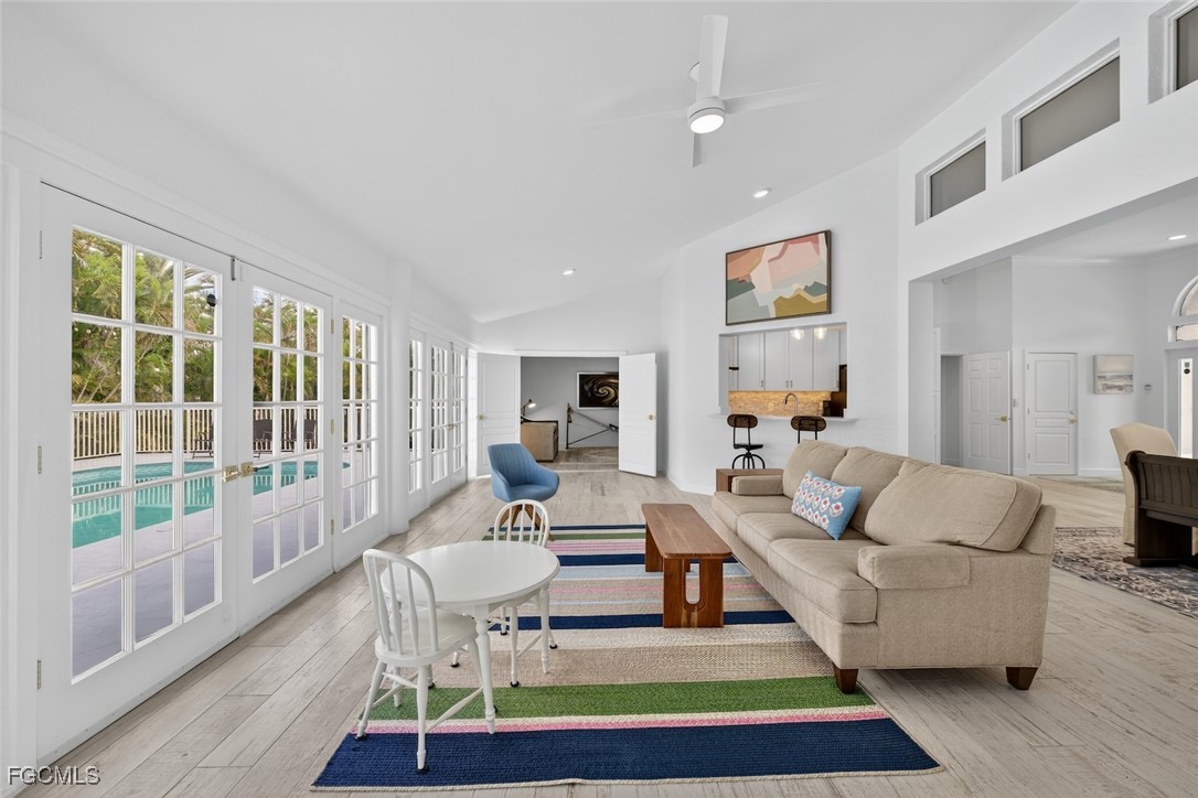 13570 Harbour Ridge Drive Fort Myers, FL 33908 - Photo 21 of 50 a living room with furniture and a large window
