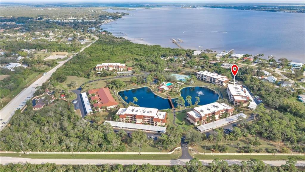 23465 Harbor View Road, Unit 723 Port Charlotte, FL 33980 - Photo 30 of 42 an aerial view of a house with a lake view