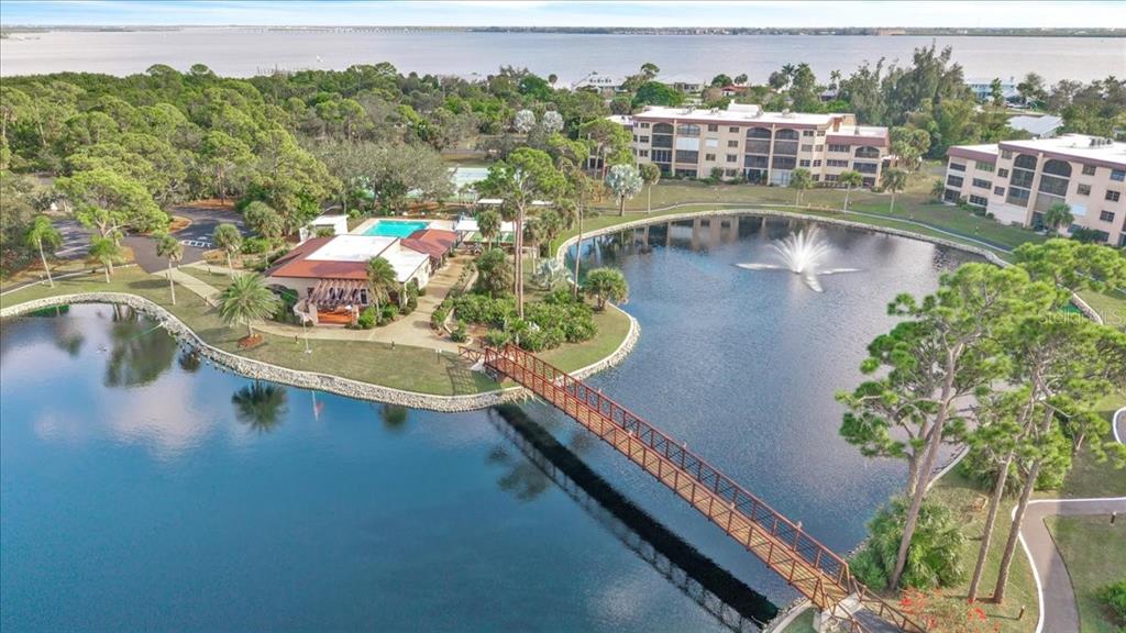 23465 Harbor View Road, Unit 723 Port Charlotte, FL 33980 - Photo 36 of 42 an aerial view of a house having outdoor space