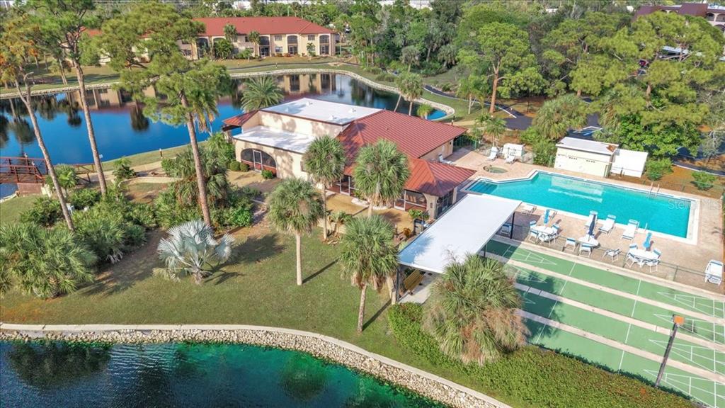 23465 Harbor View Road, Unit 723 Port Charlotte, FL 33980 - Photo 38 of 42 an aerial view of a house with outdoor space