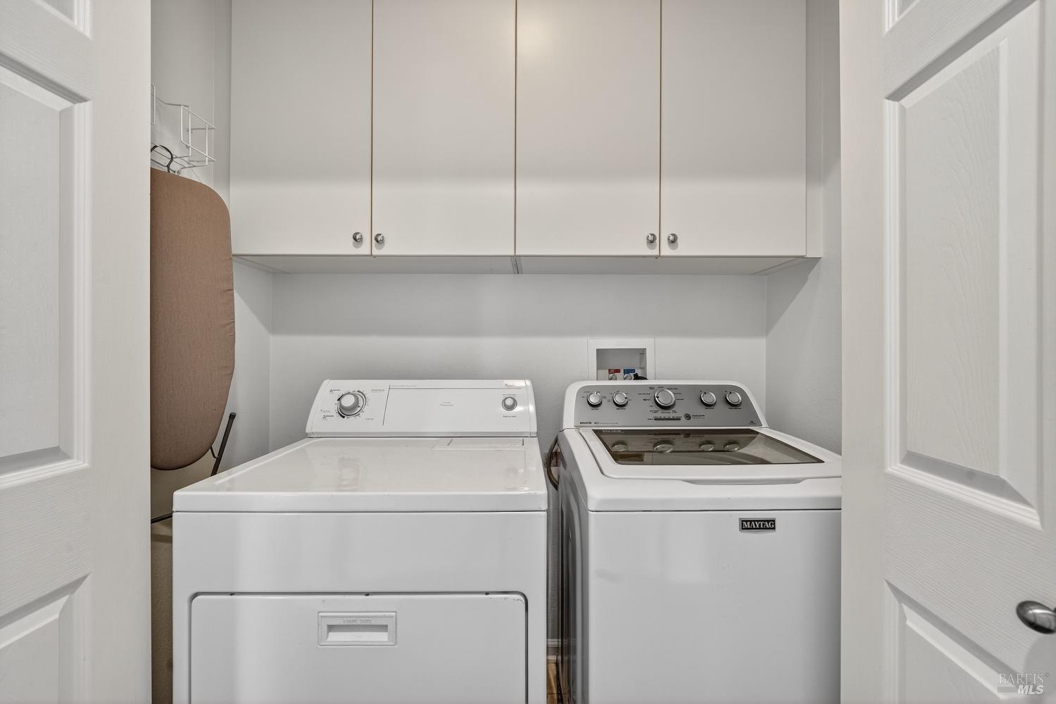 23 Greenham Court Novato, CA 94949 - Photo 16 of 20 a view of storage and utility room with washer and dryer