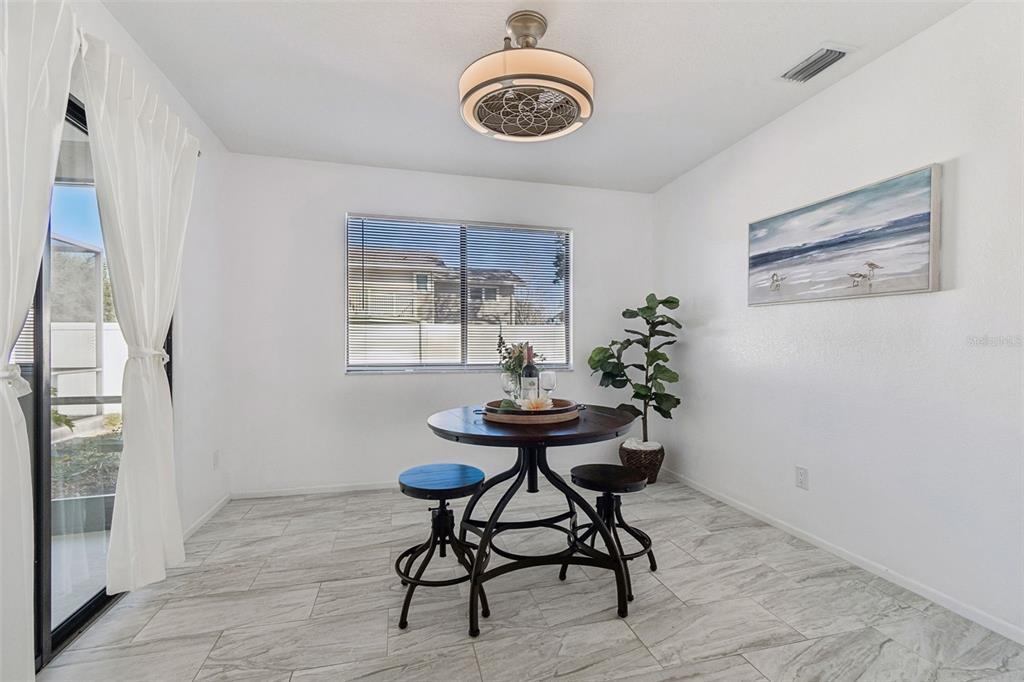 14301 86th Avenue North Seminole, FL 33776 - Photo 32 of 59 a view of a room with furniture and window