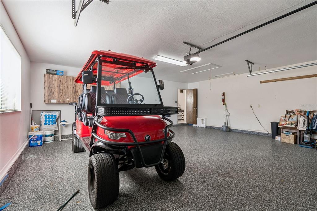 14301 86th Avenue North Seminole, FL 33776 - Photo 53 of 59 a bedroom with furniture and a bed