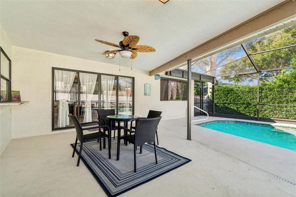14301 86th Avenue North Seminole, FL 33776 - Photo 57 of 59 a view of a dining room with furniture window and outside view
