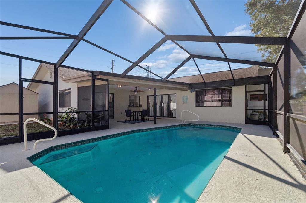 14301 86th Avenue North Seminole, FL 33776 - Photo 59 of 59 a view of a porch with furniture and garden