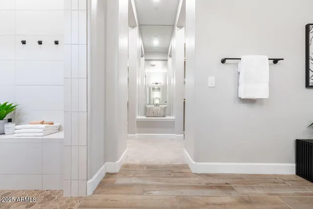 a living room with a couch and a cabinet