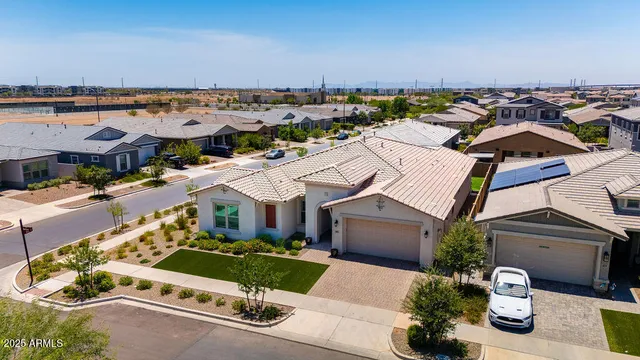 an aerial view of a house with a garden potted plants