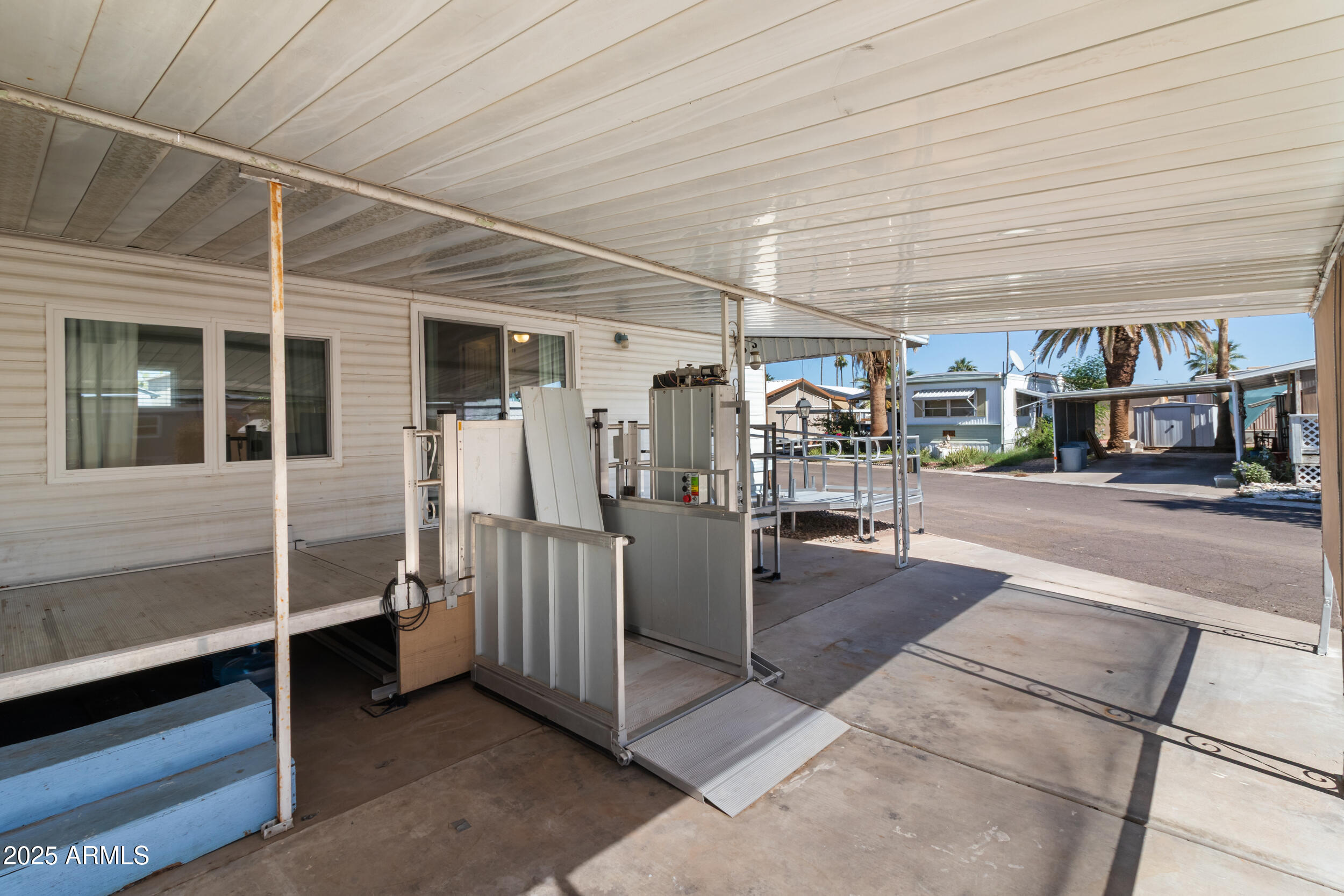 701 South Dobson Road, Unit 357 Mesa, AZ 85202 - Photo 25 of 66 a view of a porch with furniture