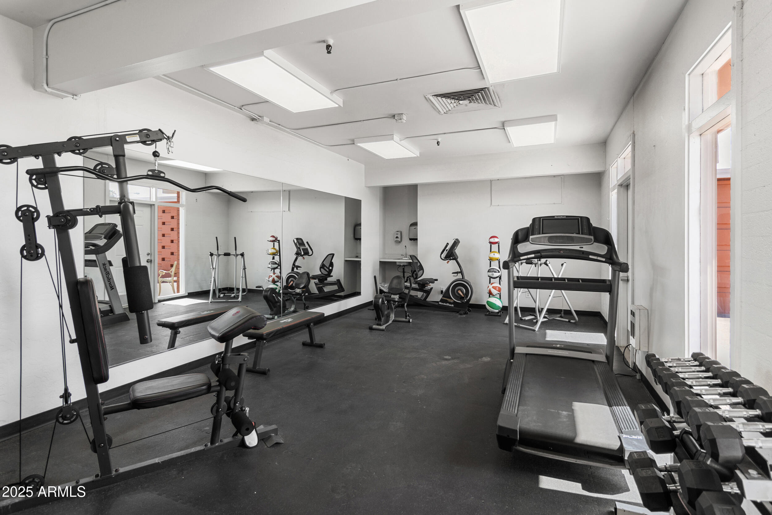 701 South Dobson Road, Unit 357 Mesa, AZ 85202 - Photo 50 of 66 a room with gym equipment