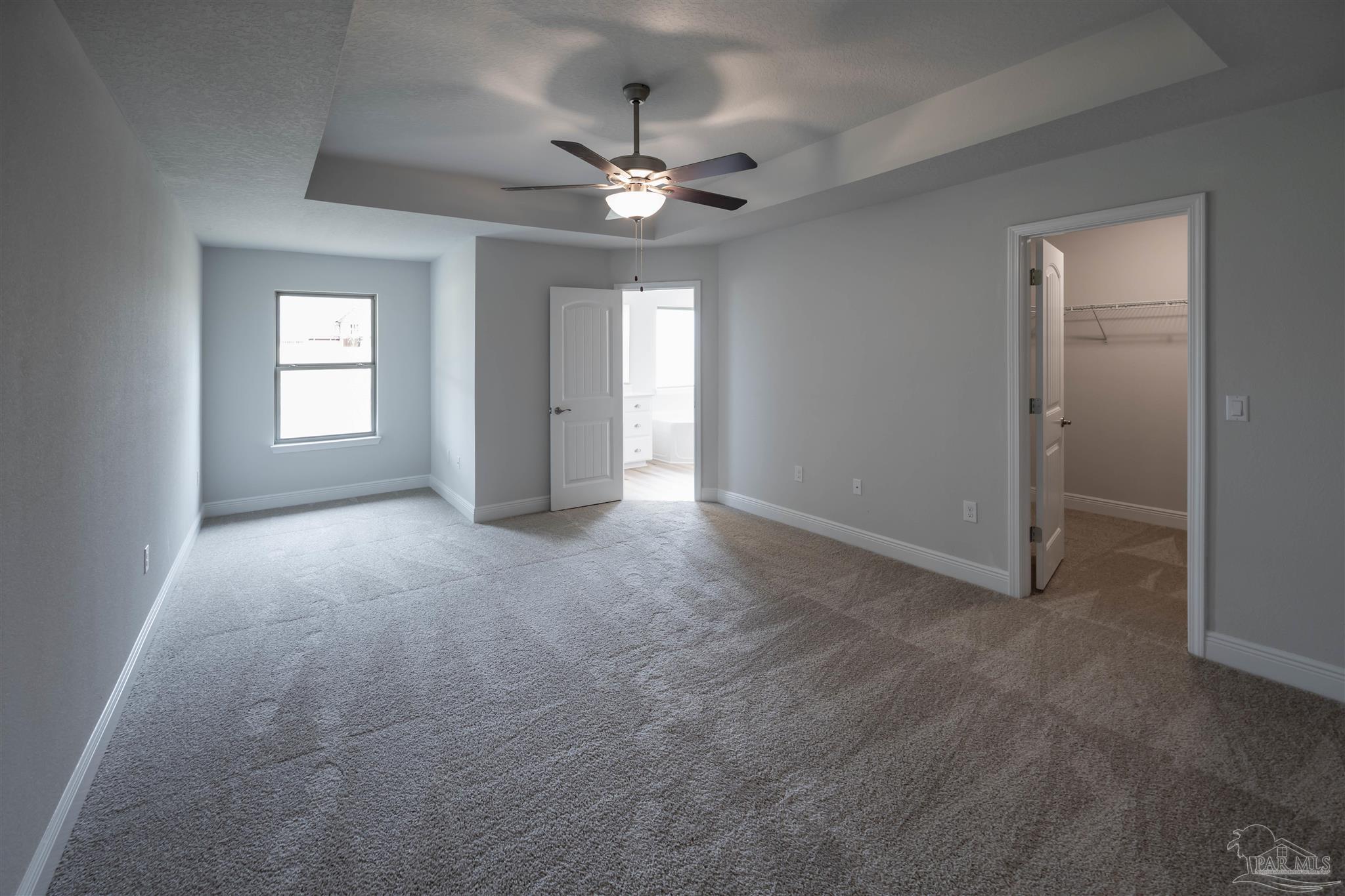 6288 Pineapple Drive Milton, FL 32570 - Photo 28 of 32 a view of an empty room with a window