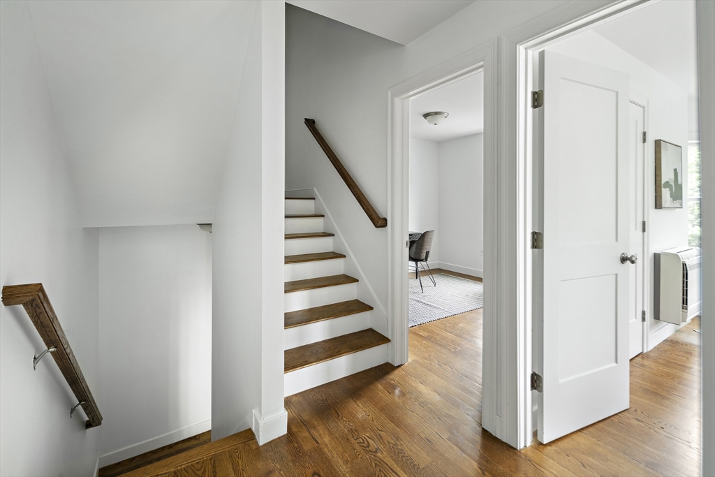 9 Cedar Street, Unit 1 Boston, MA 02119 - Photo 21 of 29 a view of entryway with wooden floor and staircase