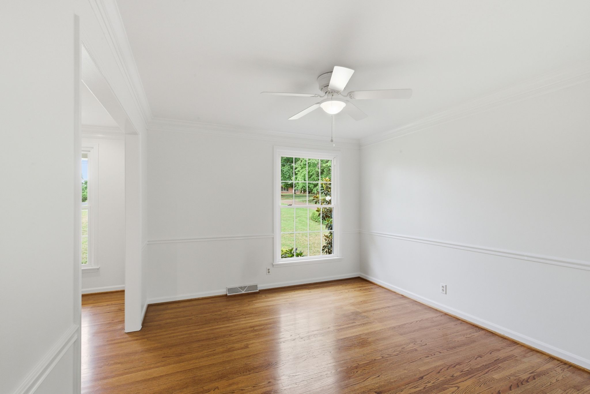 213 Rising Sun Lane Old Hickory, TN 37138 - Photo 8 of 37 an empty room with wooden floor and windows