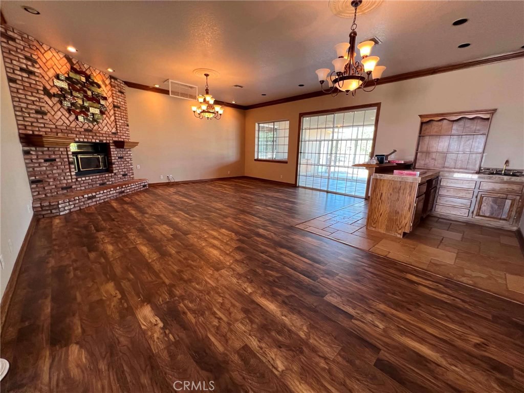 9126 Kittering Road Oak Hills, CA 92344 - Photo 14 of 47 family room, empty