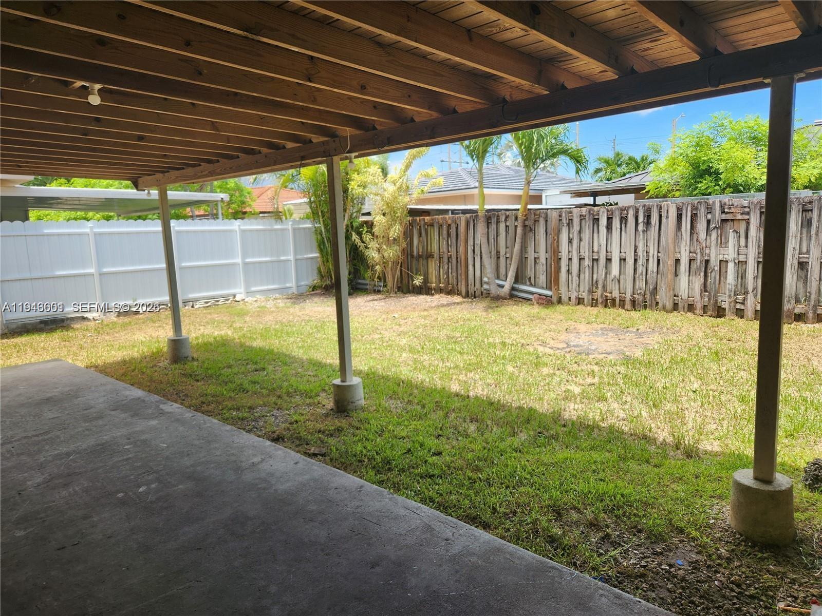 18303 Southwest 139th Place Miami, FL 33177 - Photo 18 of 19 a view of a backyard with a small cabin