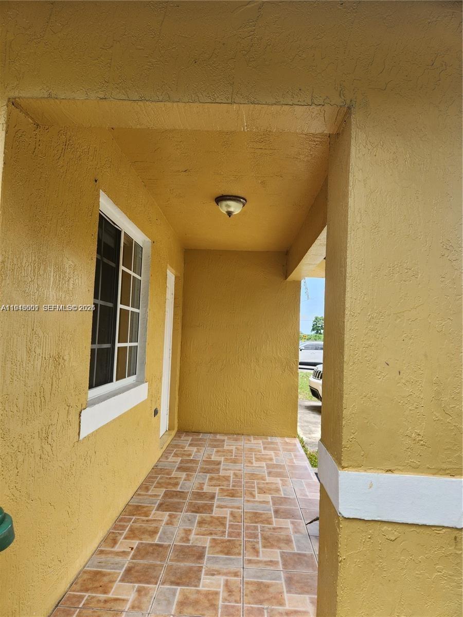 18303 Southwest 139th Place Miami, FL 33177 - Photo 2 of 19 a view of front door