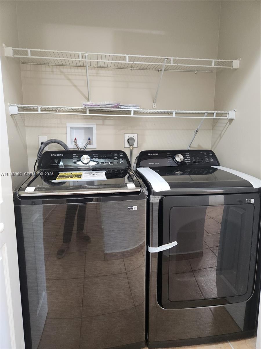 18303 Southwest 139th Place Miami, FL 33177 - Photo 9 of 19 a close view of sink and stove