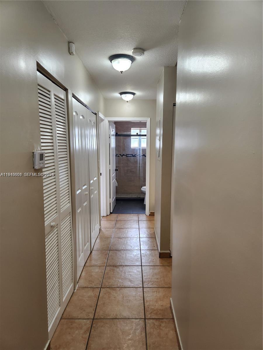 18303 Southwest 139th Place Miami, FL 33177 - Photo 10 of 19 a view of a hallway