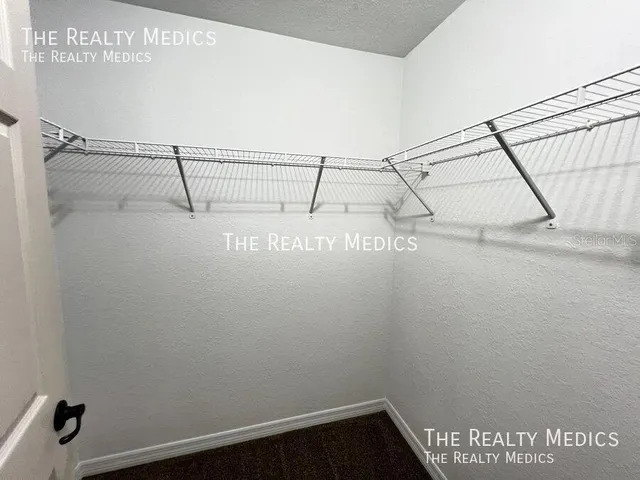 a view of small space with racks on the wall