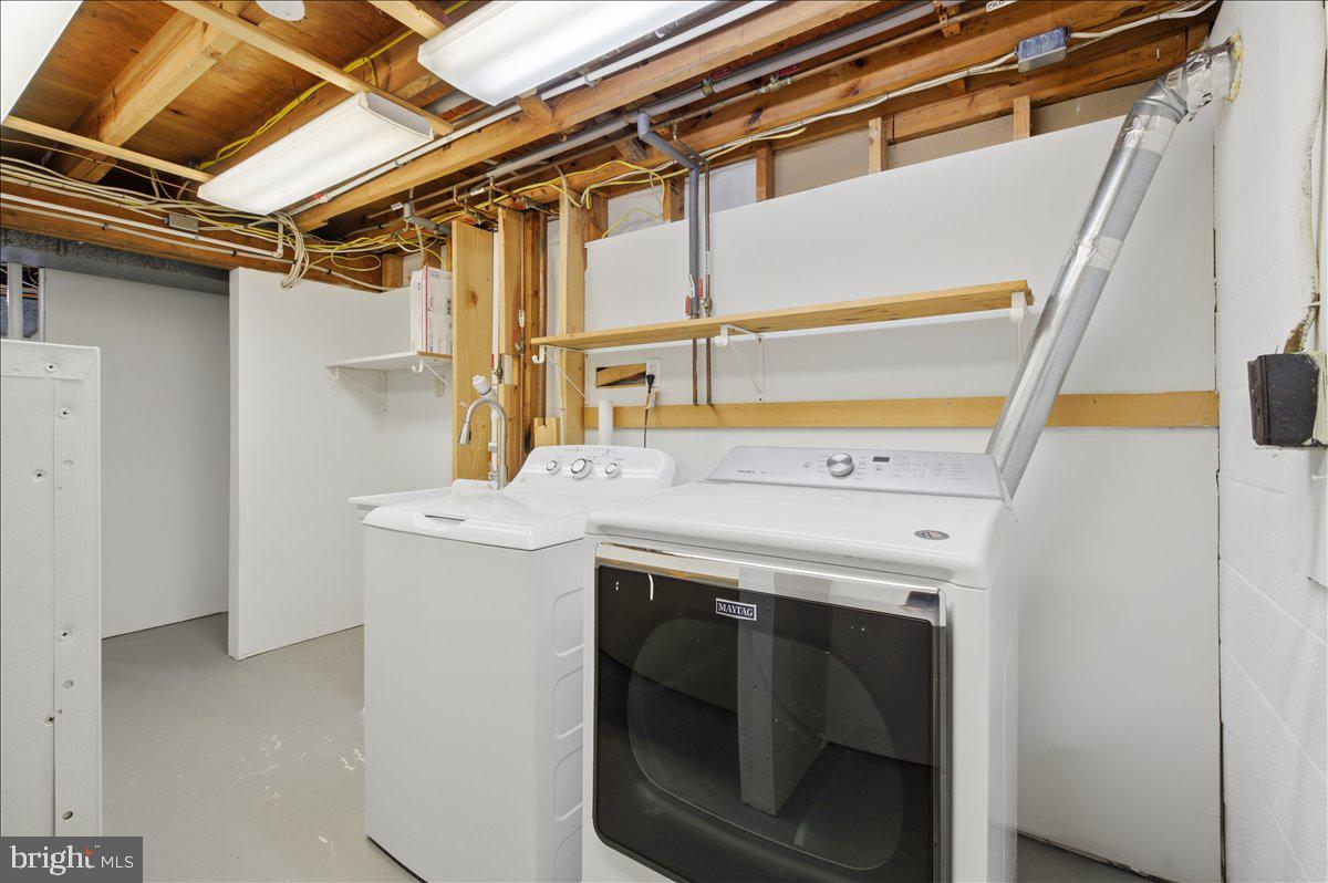 822 Walker Road Great Falls, VA 22066 - Photo 21 of 32 a utility room with dryer and washer
