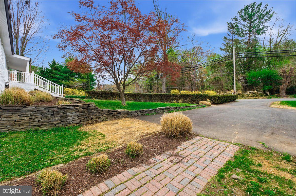 822 Walker Road Great Falls, VA 22066 - Photo 29 of 32 a car parked on the side of the road