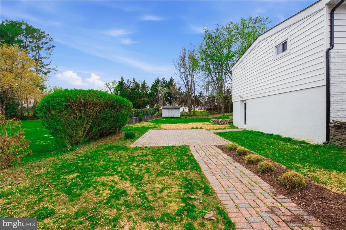 822 Walker Road Great Falls, VA 22066 - Photo 30 of 32 a view of a back yard with flower plants