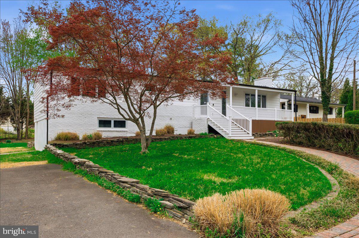 822 Walker Road Great Falls, VA 22066 - Photo 32 of 32 a front view of house with yard and green space
