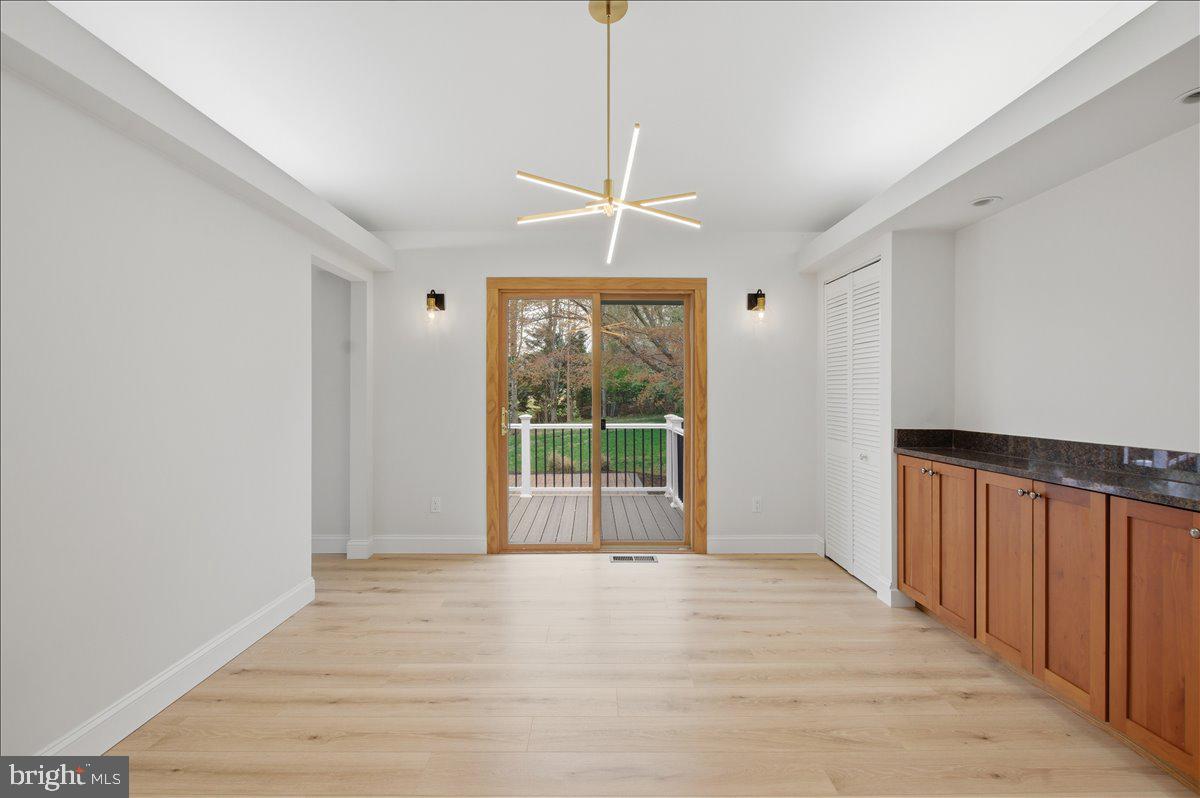 822 Walker Road Great Falls, VA 22066 - Photo 8 of 32 a view of an empty room with a window