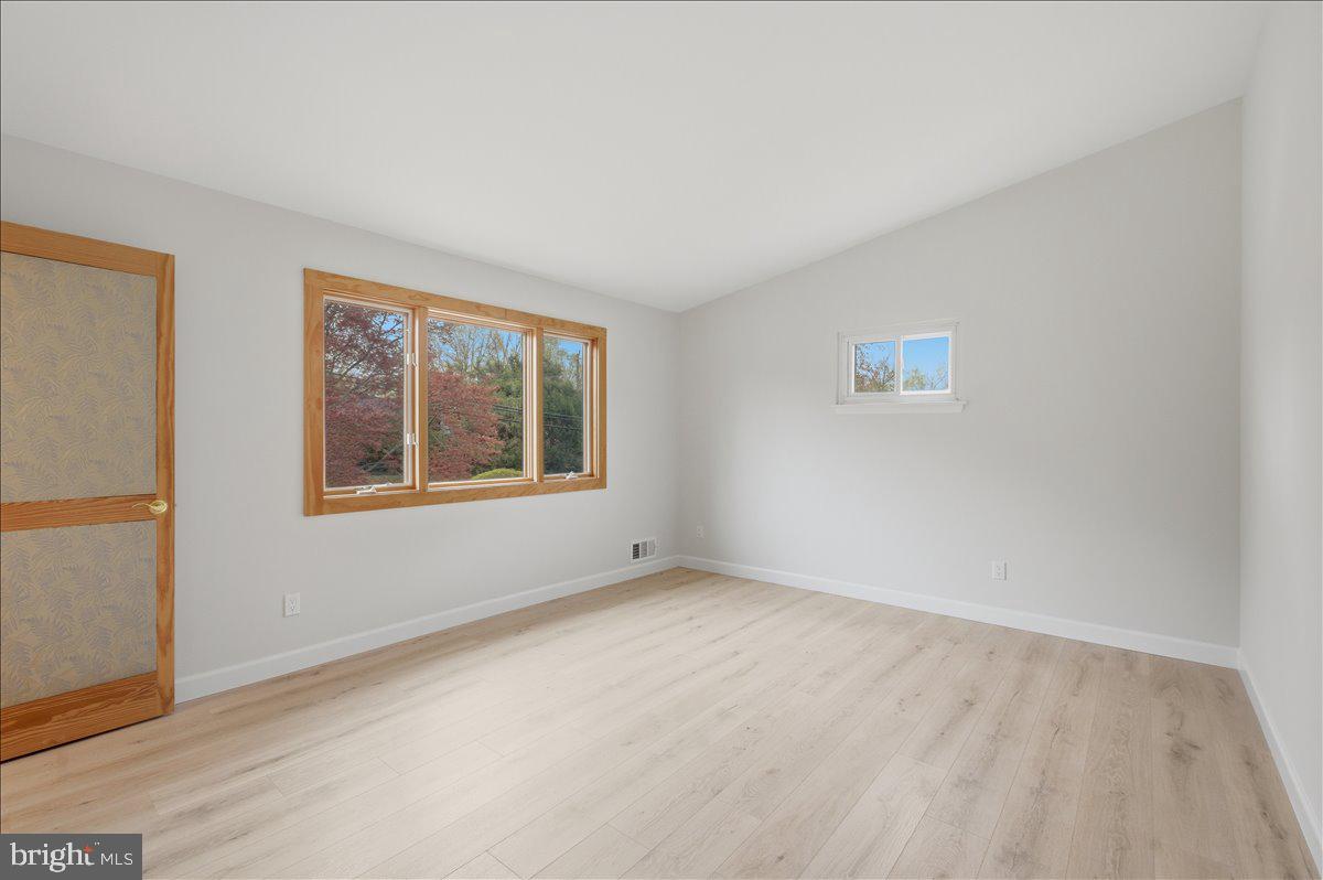 822 Walker Road Great Falls, VA 22066 - Photo 10 of 32 a view of an empty room with a window
