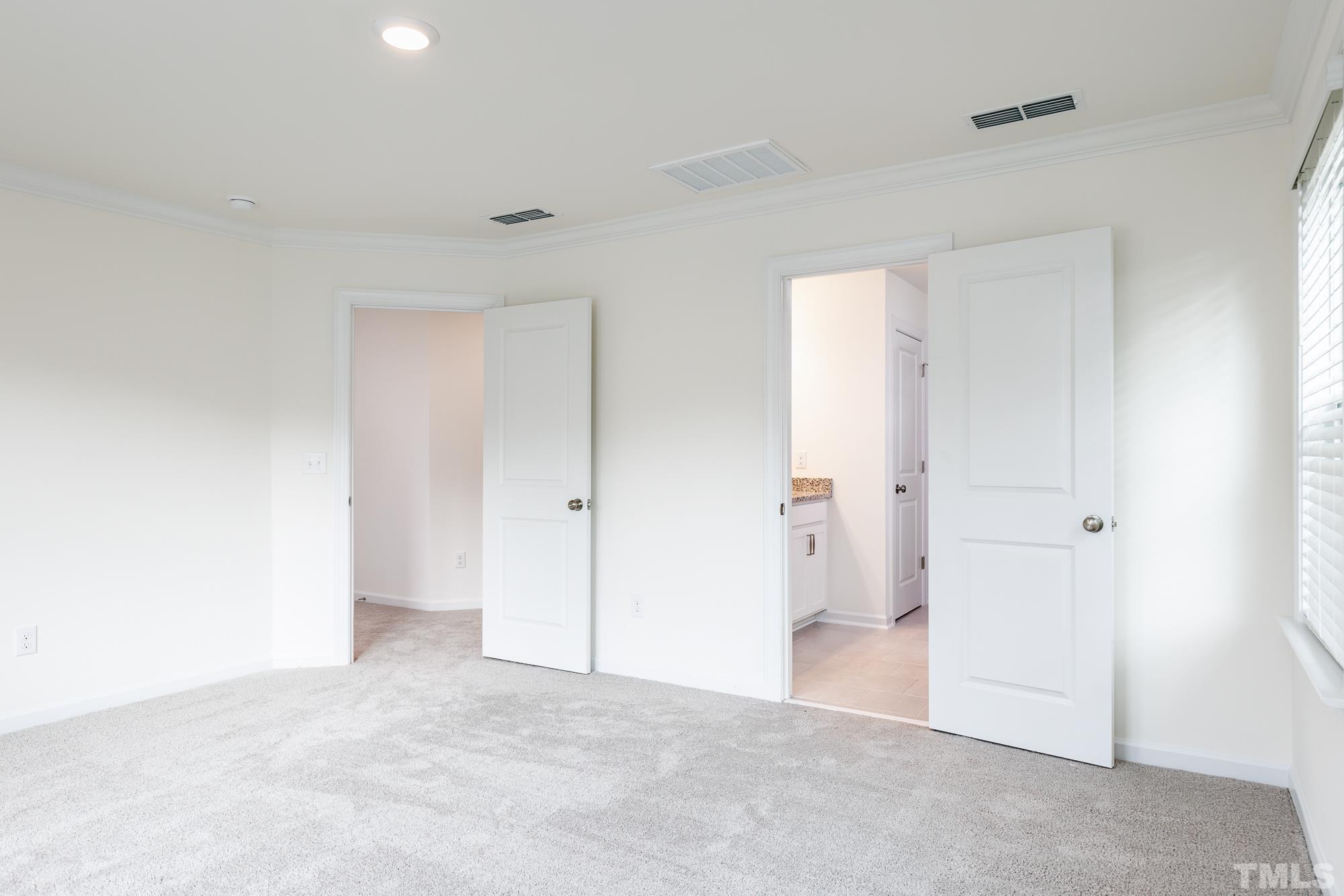 6928 Leesville Road, Unit 5 Raleigh, NC 27613 - Photo 13 of 16 a view of an empty room