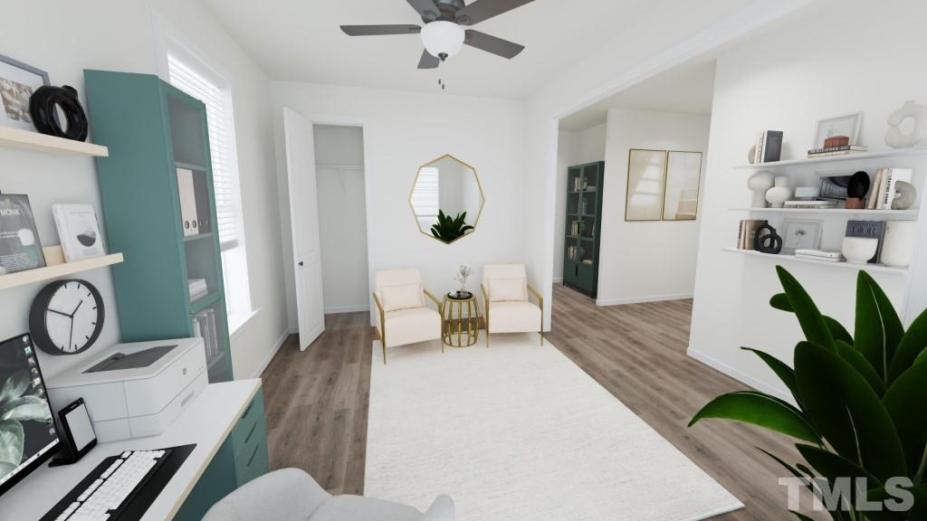 6928 Leesville Road, Unit 5 Raleigh, NC 27613 - Photo 6 of 16 a living room with furniture and a window
