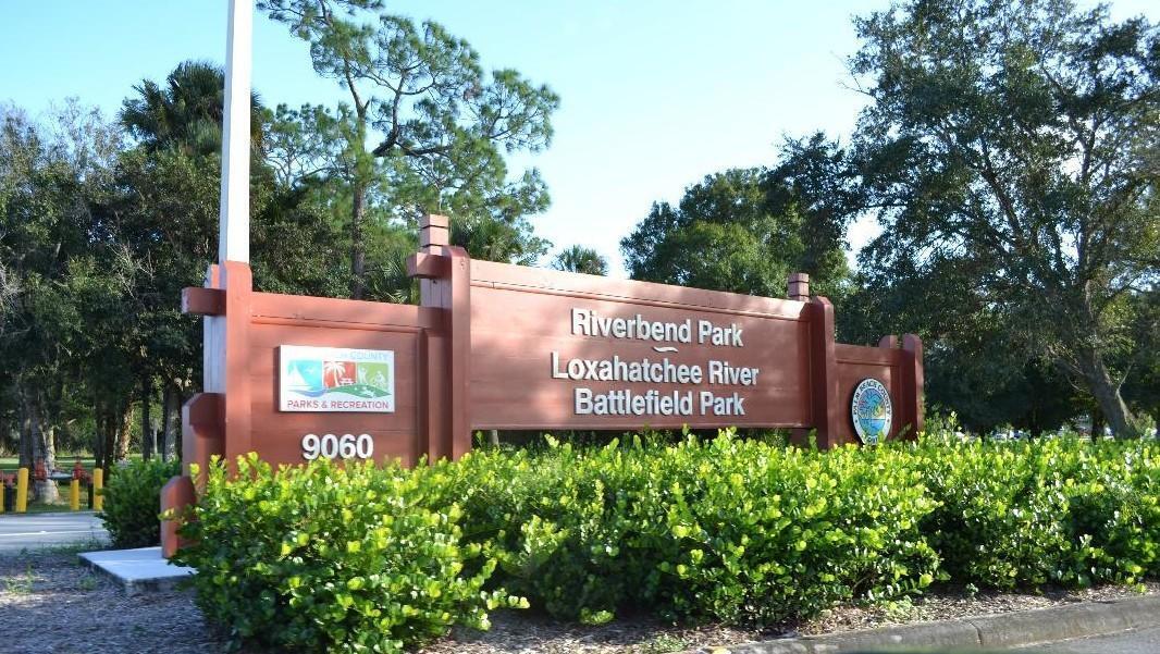 12558 165th Road North Jupiter, FL 33478 - Photo 58 of 67 a sign on the side of a building