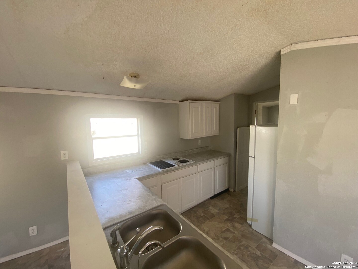 1311 Hein Road West, Unit 19 San Antonio, TX 78220 - Photo 4 of 8 a room with storage and utility