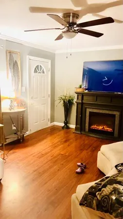 a room with furniture and a fireplace