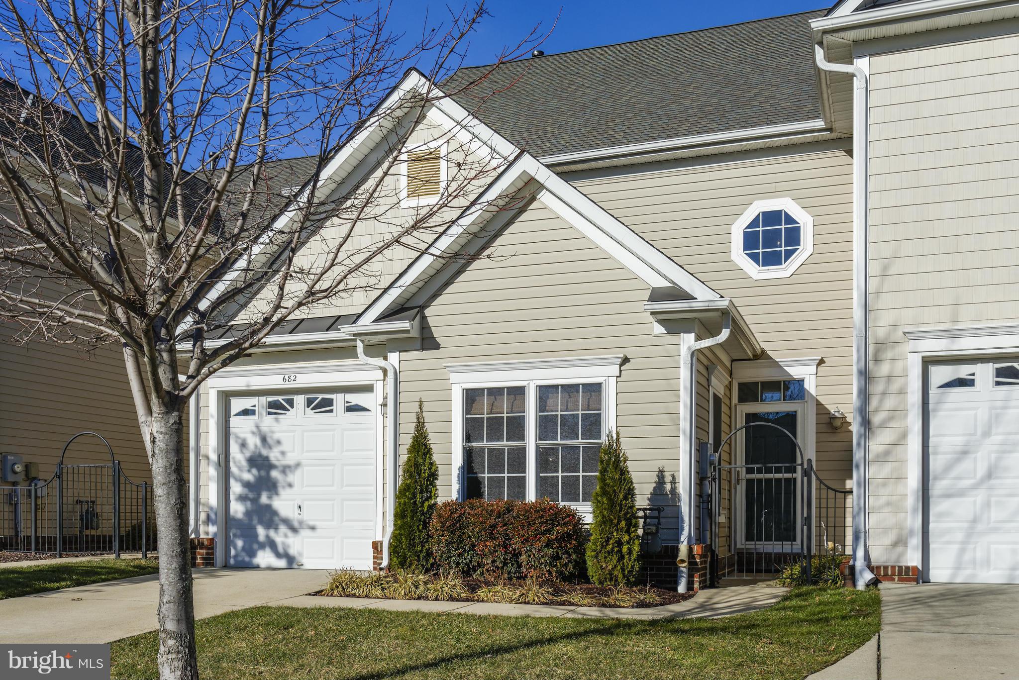 682 Ruxton Road, Unit 65 Dowell, MD 20629 - Photo 1 of 30 Landscaping with sidewalk and gated door