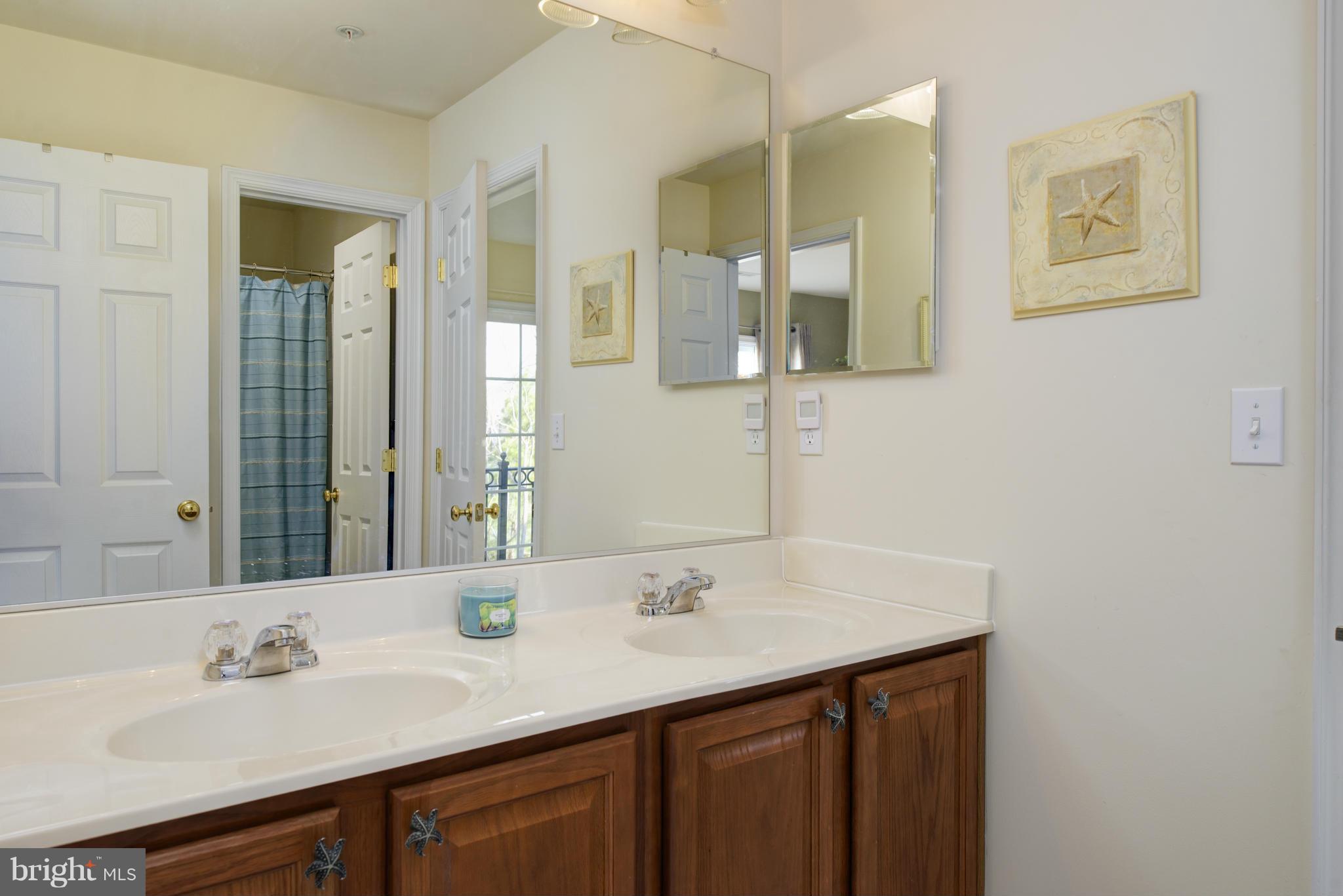682 Ruxton Road, Unit 65 Dowell, MD 20629 - Photo 19 of 30 Jack and Jill bath serves upper BRs