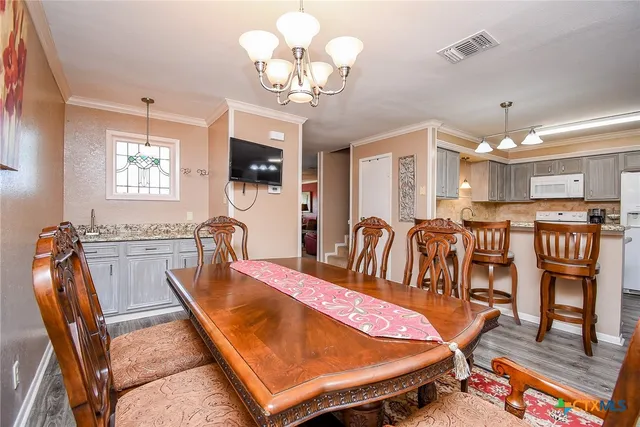 a bedroom with a bed and a lamp