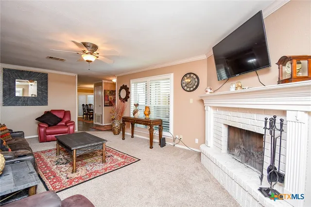 a bathroom with a granite countertop sink and cabinets