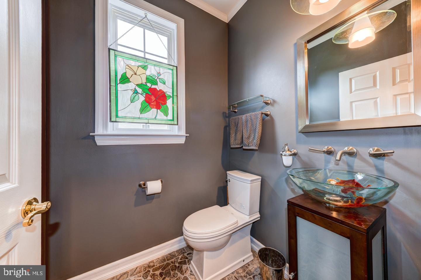 2147 Brookshire Road Furlong, PA 18925 - Photo 17 of 39 a bathroom with a toilet a sink and a window