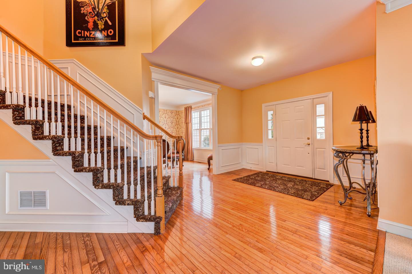 2147 Brookshire Road Furlong, PA 18925 - Photo 19 of 39 a view of a hallway with wooden floor and staircase
