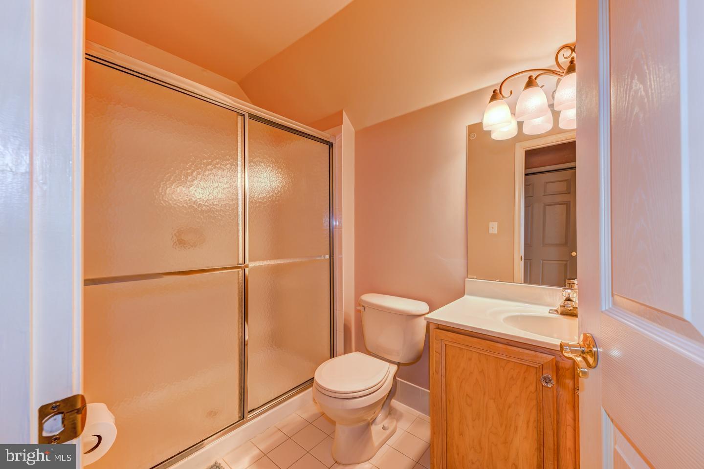 2147 Brookshire Road Furlong, PA 18925 - Photo 24 of 39 a bathroom with a toilet a sink and shower