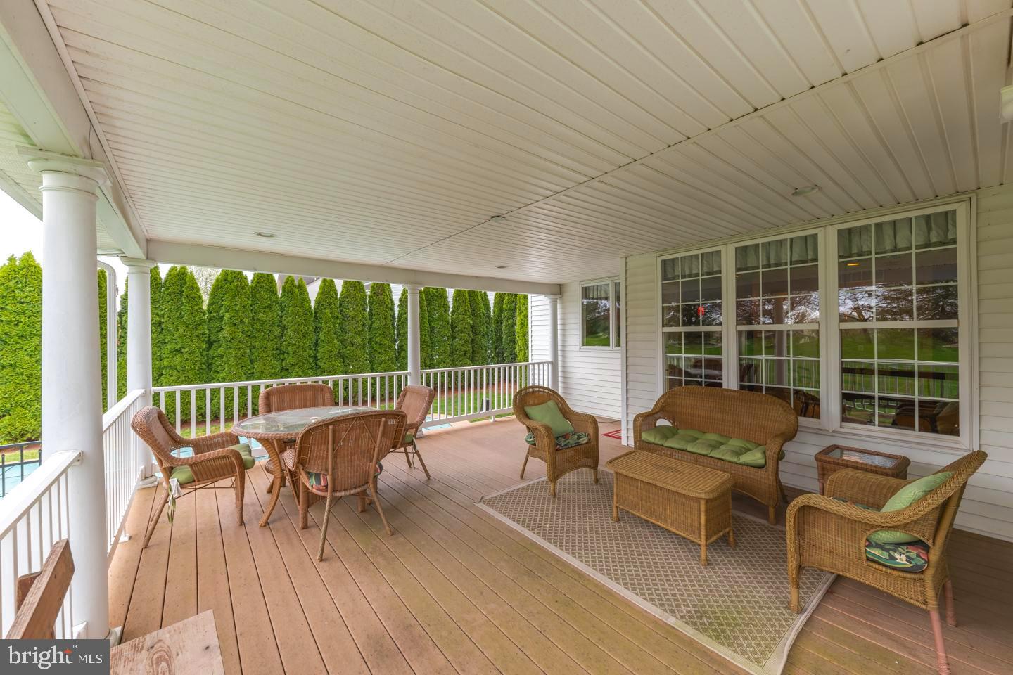 2147 Brookshire Road Furlong, PA 18925 - Photo 33 of 39 a balcony with wooden floor and outdoor seating