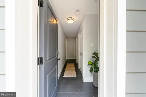 a view of a livingroom with wooden floor