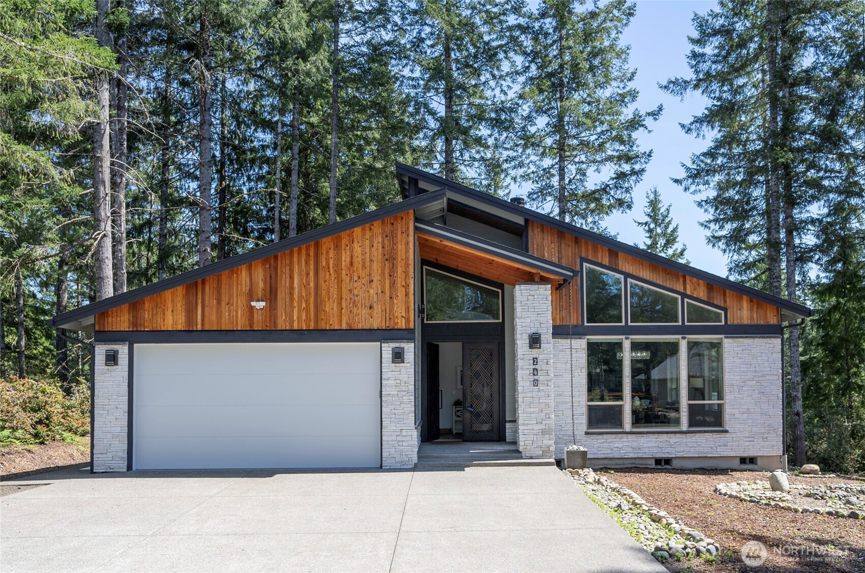 240 East Susan Lane Union, WA 98592 - Photo 1 of 40 a front view of a house with garden