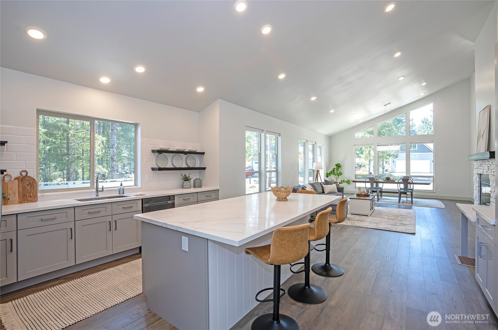 240 East Susan Lane Union, WA 98592 - Photo 12 of 40 a large kitchen with a table and chairs