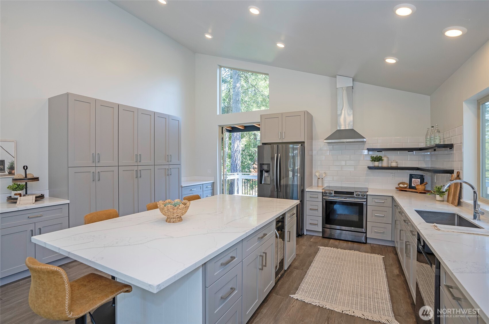 240 East Susan Lane Union, WA 98592 - Photo 13 of 40 a kitchen with a stove a sink and a refrigerator