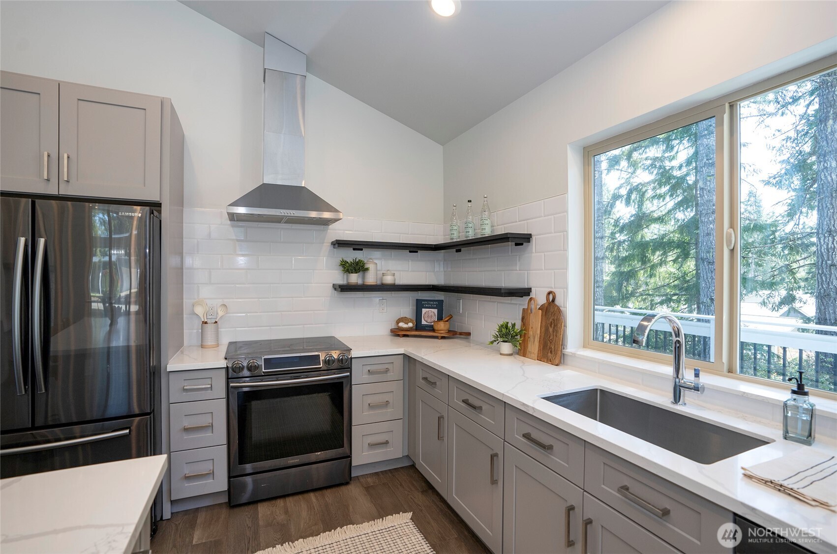 240 East Susan Lane Union, WA 98592 - Photo 16 of 40 a kitchen with a sink stove and refrigerator